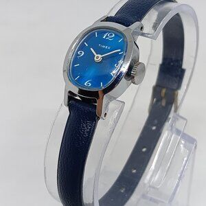 VINTAGE 1970s Timex Women's 17 mm Manual Wind Silver Tone Blue Dial Watch